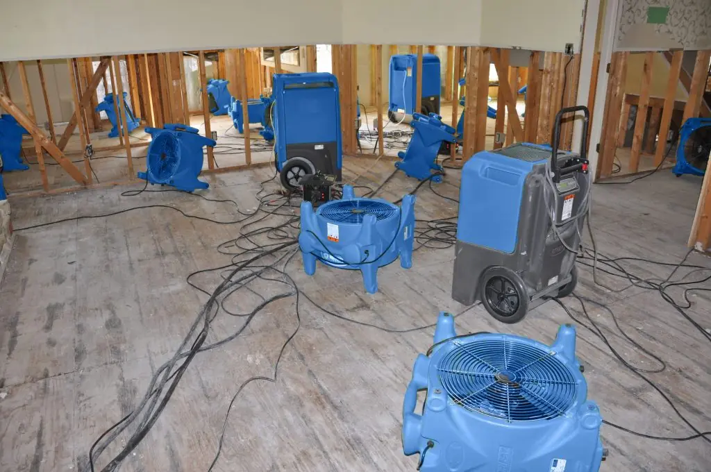 Water damage restoration crew working in West End, TX